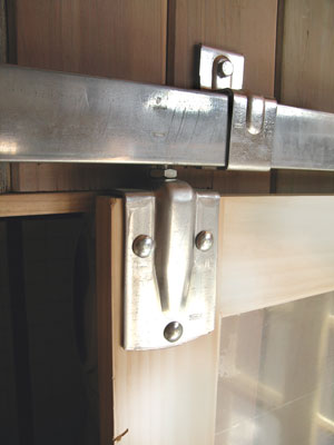 Made to handle heavy barn doors, this hardware will take on any vintage door. All the hardware is exposed and easy to install once you understand the basic components and configuration.